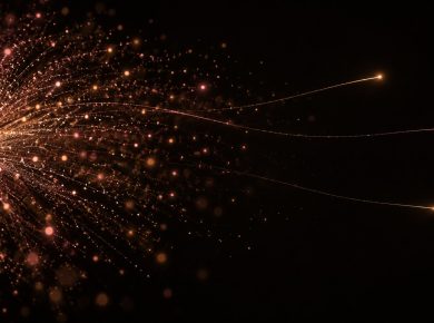 Abstract light study of a particle burst mostly fading, a few trails carrying across